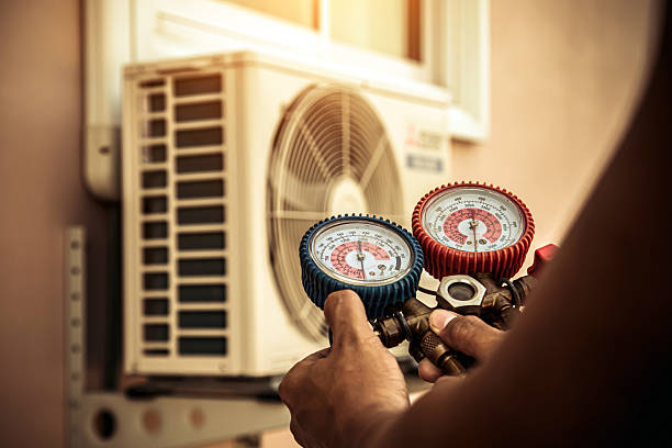 Professional Heat Pump Repair technician working in Springfield, NE